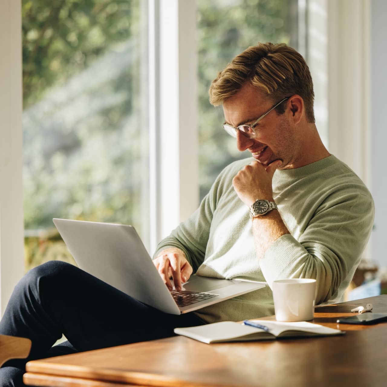man on macbook
